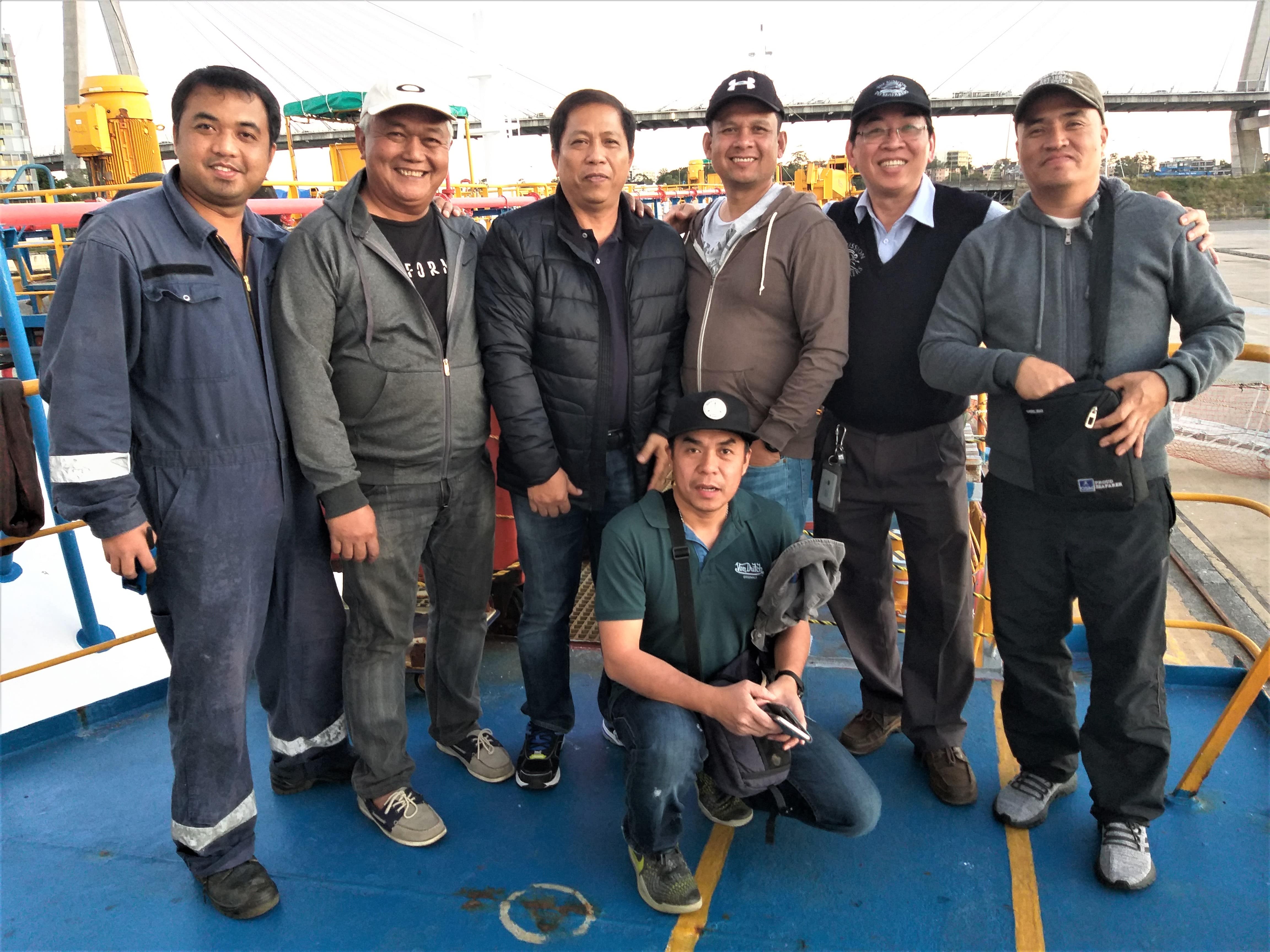 Reverend Tay with a group of seafarers 